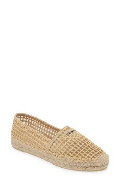 A mesh upper overlaid with woven raffia brings breezy charm to this laid-back espadrille branded with a subtle version of Prada's iconic triangular logo. 3/4" (19mm) platform (size 9US / 39EU) Textile upper and lining/synthetic sole Made in Spain Designer Shoes Elegant Espadrilles With Woven Sole For Vacation, Elegant Espadrilles With Woven Sole For Beach, Beige Woven Leather Espadrilles For Spring, Spring Beige Woven Leather Espadrilles, Elegant Straw Espadrilles For Spring, Elegant Beach Espadrilles With Woven Sole, Elegant Beige Straw Espadrilles, Casual Beige Espadrilles With Woven Leather, Casual Beige Woven Leather Espadrilles