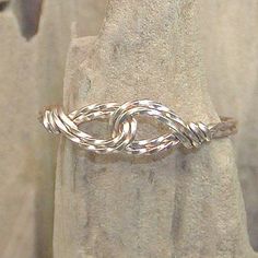 Two very thin 14kt gold filled twist wires, swirled together in an interlocked infinity design. My best-selling thumb ring design! Available in any size, this ring is especially perfect for you ladies who have larger or smaller hands, and who have a hard time finding awesome rings that will fit you! Gold Wire Ring, Infinity Design, Wire Ring, Simple Ring, Thumb Ring, Twisted Wire, Wire Rings, Thumb Rings, Gold Wire