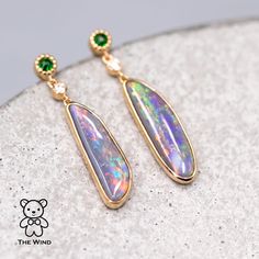 Stylish Australian Fossil Shell Opal Diamond Tsavorite Drop Earrings 18K Yellow Gold. Opalized Shell Fossil is very rare compared with regular opal. Free Domestic USPS First Class Shipping! Free One Year Limited Warranty! Free Gift Bag or Box with every order! Opal—the queen of gemstones, is one of the most beautiful and rarest gemstones on earth. Every piece of opals has its colors and patterns, which is perfect for designers to create unique engagement rings for someone extra special. We use 1 Yellow Gold Tsavorite Gemstone Earrings, Gold Tsavorite Gemstone Earrings, Yellow Gold Tsavorite Earrings Fine Jewelry, Gold Tsavorite Earrings Fine Jewelry, Tsavorite Gemstone Earrings For May Birthstone, Tsavorite Yellow Gold Earrings For Gift, Yellow Gold Tsavorite Earrings As Gift, Green Emerald Multi-stone Earrings, Rarest Gemstones