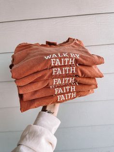 Embroidered walk by faith Tshirt Sizing: Unisex (see size guide in photos for measurements) Color: Yam, Sage, Pepper, or Denim Thread Color: White Material: 100% Cotton Brand: Comfort Colors  *cannot be personalized or have default embroidery changed* PROCESSING/TURNAROUND TIME: -Processing/Turn around times may vary. Please check the estimated ship/delivery times.  -Processing/Turn around time DOES NOT include shipping time. Cute Christian Shirts For Women, Faith Based Apparel, Cute Christian Girl Outfits, Christian Clothes, Faith Tshirts, Christian Graphic Tees, Jesus Clothes, Christian Shirts Designs, Faith Clothing