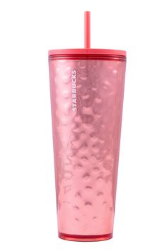 a pink tumbler cup with a straw sticking out of it