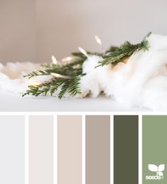 the color scheme is green, white and grey with some greenery on top of it