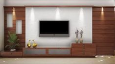 a large flat screen tv mounted to the side of a wall in a living room