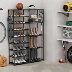 there is a rack with many pairs of shoes on it and a bike in the background