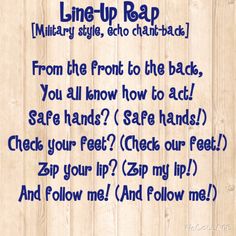 a wooden background with the words line up rap written in blue ink on top of it