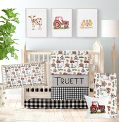 a baby crib bedding set with farm animals and tractor prints on the wall