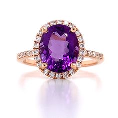 Amethyst And Diamond Ring.Metal: 18K White GoldDiamond Shape: 34 Brilliant Round Cut 0.28ct twGemstone Details: 1 Amethyst 2.66ct Dimensions: 13mm Amethyst And Diamond Ring, Rose Gold Diamond Ring, White Gold Diamond Rings, Jewelry Metal, Ring Metal, Amethyst Gemstone, Yellow Gold Rings, Someone Special, Round Cut