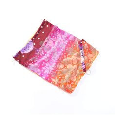 an orange, pink and purple scarf on a white background