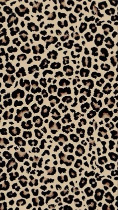 an animal print fabric with black and brown spots