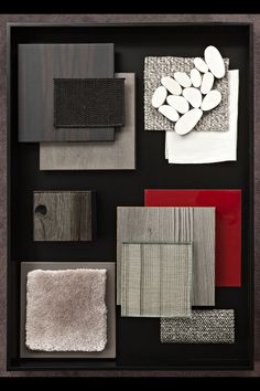 an assortment of different materials are displayed on a black surface