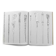 an open book with drawings of different types of objects on the cover and inside pages