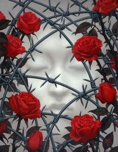 barbed wire with red roses on it and a woman's face in the background