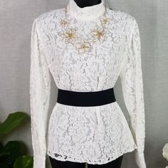 This Ralph Lauren Blouse Is Super Feminine, Delicate And Airy. Adds A Touch Of Chic And Class To Any Outfit, Dress It Up With A Skirt Or Down With Jeans. This Blouse Looks Good With Anything. Has A High Neck With Hidden Zipper On Back. Lace Overlay With Lining Underneath, Sleeves Are Unlined. Nwt Does Not Include Any Accessories, Blouse Only. Elegant Lace Blouse For Work, Elegant Lace Top For Workwear, Elegant Long Sleeve Lace Top For Formal Occasions, Fitted Lace Top Blouse For Work, White Long Sleeve Lace Top For Formal Occasions, White Long Sleeve Lace Top For Formal Events, White Lace Top For Formal Occasions, Elegant Long Sleeve Lace Top For Work, Formal White Lace Top