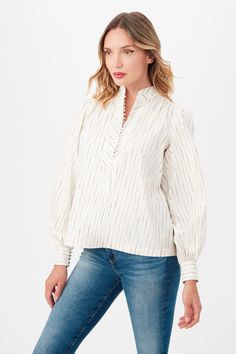 Add a touch of luxury to your wardrobe with this long sleeve shirt, made from luxe cotton silk slub with a modern and timeless vertical stripe design. Featuring a chic Mandarin collar, a front button and loop half placket, long puff sleeves, and gathered detailing at the shoulders and back yoke, this shirt's A-line fit offers a flattering silhouette, effortlessly blending timeless style with contemporary flair. By Trina Turk. Pair it with your favorite Carrie Dunham bag! Saharan Cotton Silk Slub Wrap Shoes, Embroidered Monogram, Trina Turk, Long Puff Sleeves, Mandarin Collar, Cotton Silk, Stripes Design, Dress Accessories, Puff Sleeve