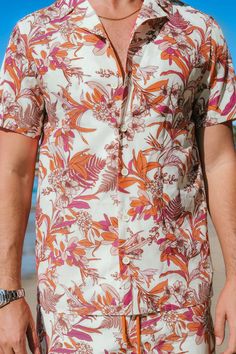 Elevate your summer style with our Coral Flower Tropical Button-Up Shirt for men. The vibrant print exudes tropical vibes, making it an ideal choice for both casual and beach-ready looks. Product code: CBA12A4A002DK Features:  Woven  Collared neckline  Short sleeves  Front buttons  Regular fit Pattern: Tropical Wash Method: Hand Wash Material: 100%POLYESTER. Summer Printed Hawaiian Button-up Shirt, Casual Shirt With Hibiscus Print For Spring, Collared Camp Shirt With Hibiscus Print For Summer, Spring Hibiscus Print Shirt With Camp Collar, Casual Button-up Shirt With Hibiscus Print, Casual Hawaiian Shirt With Floral Print, Relaxed Fit, Spring Beach Hawaiian Button-up Shirt, Spring Button-up Shirt With Hibiscus Print, Spring Hibiscus Print Button-up Shirt