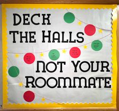 a bulletin board that has been decorated with christmas balls and garlands, which reads deck the hall's not your roommate