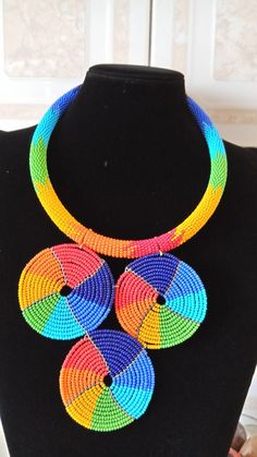 Colorful Beaded Necklace, Rainbow African Beaded Jewelry, African Necklace, Handmade Necklace, Multi color Necklace, Gift For Her, NecklaceThis colorful beaded necklace is superbly crafted which can be worn with any outfit at different occasions and it will absolutely makes you stand out.Main color - Rainbow.The necklace can be available in plain colors.Wholesale available at a fair price,please contact me.For any clarification,please send me a convo or an e-mail.Thank you for visiting and happy Multicolor Beaded Necklaces With Round Beads, Colorful Beaded Necklaces With Large Round Beads, Colorful Beaded Necklace With Large Round Beads, Multicolor Large Beads Necklace For Jewelry Making, Handmade Rainbow Beaded Necklaces With Round Beads, Multicolor Necklaces With Spacer And Round Beads, Multicolor Large Beads For Jewelry Making, Multicolor Beaded Chain With Round Beads, Handmade Multicolor Beaded Necklaces With Round Beads