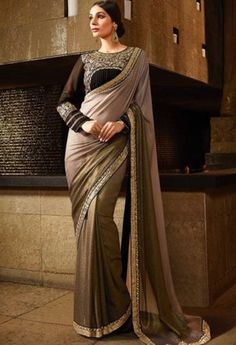 Brown Shimmer Georgette Designer Saree..@ fashionsbyindia.com #designs #indian #fashion #womens #style #cloths #clothes #stylish #casual #fashionsbyindia #punjabi #suits #wedding #saree #chic #elegance #beauty #outfits #fantasy #embroidered #dress #PakistaniFashion #Fashion #Longsuit #FloralEmbroidery #Fashionista #Fashion2015 #IndianWear #WeddingWear #Bridesmaid #BridalWear #PartyWear #Occasion #OnlineShopping #sari Navy Blue Saree, Pakistan Clothes, Blue Silk Saree, Sari Design, Indian Sarees Online, Silk Saree Blouse, Designer Sarees Online