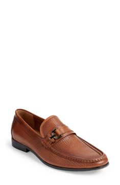 A polished metal accent bridges the vamp of this luxe loafer designed with a woven leather upper and sleek burnished finish. Leather upper/synthetic lining and sole Imported Penny Loafers Men, Rollerball Perfume, Johnston Murphy, Penny Loafers, Loafer Shoes, Loafers Men, Travel Size Products, Steve Madden, Rubber Sole