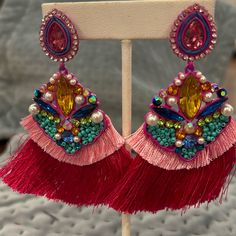 Vacation Ready Statement Earrings Will Be Your Outfit!! Super Cute Pink Fringe Layers And Beautiful Beadwork Make This Statement Earring So Pretty. 3.5” X 2.5” Crystal, Faux Pearls And Seed Beads Surgical Steel Posts Lightweight Design 44e Trendy Pink Earrings With Dangling Beads, Summer Party Chandelier Earrings With Tassels, Bohemian Dangle Crystal Earrings For Party, Elegant Tassel Earrings With Colorful Beads For Party, Handmade Multicolor Crystal Earrings For Party, Bohemian Multicolor Crystal Earrings For Party, Beaded Bohemian Chandelier Earrings For Party, Bohemian Beaded Chandelier Earrings For Party, Elegant Multicolor Tassel Earrings For Party