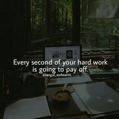 a laptop computer sitting on top of a desk next to a window with the words, every second of your hard work is going to pay off