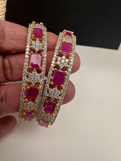 Traditional Bangles comes in set of 4Color : GoldSize : Size : 2.4Stones : AD Red Stones Ruby Bangle With Stone Work For Wedding, Festive Red Bangle With Stone Work, Ruby Stone Bangles Gold, Luxury Red Ruby Bangle, Red Bollywood Bangle With Stone Work, Traditional Bangles, Stone Bangles, Ruby Bangles, Red Bangles