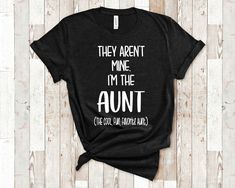 a black t - shirt that says they aren't mine i'm the adult