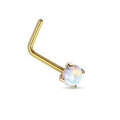 a gold nose piercing with an opal stone