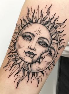 a sun and moon tattoo on the arm