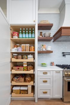 an open pantry with lots of food in it