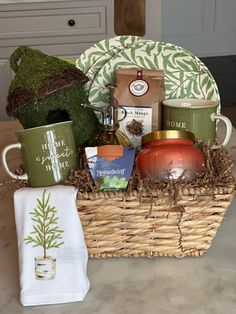 a basket filled with coffee, tea and other items