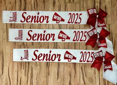 three red and white ribbons with the words senior was, senior was, senior was