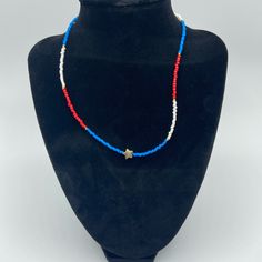 Brand New Handmade Glass Seed Bead 4th Of July Necklace/Choker With Star Charm Handmade In Nyc With Lots Of Love! 2mm Crystal Glass Seed Beads. Gold Star Shape Charm Measures 3 X 8mm. High Quality Stringing Wire. Gold Plated Screw Clasp. Red, White, Blue And Gold. 16” Inches Long. Handmade White Star Beaded Necklaces, White Star Beaded Necklace With Star Charm, 4th Of July Beaded Necklace, Handmade Blue Star Beaded Necklaces, Handmade White Star-shaped Beaded Necklaces, Handmade White Star-shaped Beaded Necklace, Handmade Blue Beaded Star Necklaces, Adjustable Blue Beaded Star Necklaces, White Star-shaped Beaded Necklaces