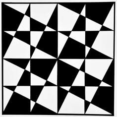 a black and white pattern with triangles on it