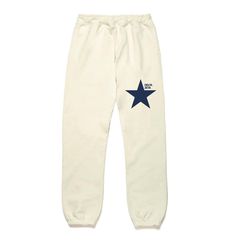 a white sweat pants with blue stars on the side