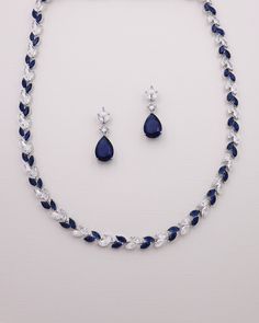 This exquisitely crafted Wedding Jewelry Set boasts top grade cubic zirconia clear and sapphire colored blue stones in marquise and pear cuts. Perfect for the bride who wants a touch of blue or mother of the bride or groom to finish off their wedding day attire.  DETAILS * High quality cubic zirconia.  * Earrings measure 1 1/4 inch long. * Necklace measures 17 1/2 inches long. * Perfect for brides, bridesmaids, mother of the bride, mother of the groom, prom, or any special occasion.  * Optional bracelet is adjustable with a removable extender from 7-8 inches long. * Finish: silver. * Hypoallergenic, lead-free & nickel-free. ADDITIONAL LENGTH WITH EXTENDER * Necklace extender available here: https://www.etsy.com/listing/1527588142/extender-for-necklace-clasp-extender?ref=listings_manager_gr Sapphire Wedding Jewelry Brides, Blue Diamond Necklace, Formal Necklace, Blue Jewelry Set, Blue Sapphire Jewelry, Clear Jewelry, Earrings Necklace Set, Fancy Jewelry Necklace, Fancy Jewellery Designs