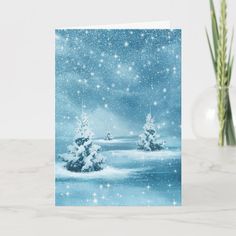 a snowy christmas card with trees and snow flakes