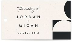 a white and black wedding card with an abstract design