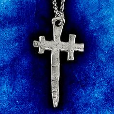 If you're looking for a new way to carry your faith, the Cross crosslet pendant is perfect. Solid 925 sterling silver heraldic medieval style cross with ends of two arms crossed. Available in polished silver or polished oxidised silver as a pendant only or on a selection of chain lengths. Cross measures 48mm X 27mm. Material : 925 Sterling Silver. Made to order in our Jewel Thief Brighton Atelier. Hand Forged Silver Medieval Jewelry, Hand Forged Medieval Silver Jewelry, Medieval Sterling Silver Necklace In Silver, Medieval Engraved Cross Pendant Jewelry, Medieval Silver Cross Pendant Jewelry, Medieval Hand Forged Sterling Silver Jewelry, Medieval Silver Cross Jewelry, Medieval Style Hallmarked Silver Jewelry, Medieval Engraved Cross Jewelry