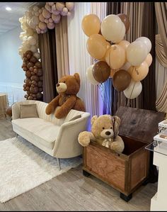 two teddy bears sitting on a couch with balloons in the air