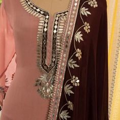 Item Overview ATHARVA Hand Embroidered Salwar Kamiz/Pink Chanderi Shirt/Maroon velvet Dupatta/Custom Stitch Unstitch/Custom Anarkali/Sharara/Gift Dno. CH1745B Fabric:  * Shirt: Chanderi Silk- Beautiful Neck/ 2.5 Mts/Stitch-Unstitch/Customized Anarkali or Sharara * Dupatta: Velvet Dupatta 2.5Mts/Hand embroidery Gota Patti Work/Trim Border/Lace/Stone Work/Latkans Tassels  * Bottom- Santoon Silk/ It doesn't require Lining/2.5 Mts. Excusive Hand Embroidered Party Wear Punjabi Suit. 🌷CUSTOMIZATION ( Luxury Bollywood Churidar With Zari Weaving, Patiala Salwar Kameez, Velvet Suit Design, Velvet Dupatta, Embroidered Salwar, Gota Patti Work, Embroidery Suits Punjabi, Suits Punjabi, Beautiful Neck