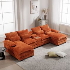 an orange sectional sofa in a living room