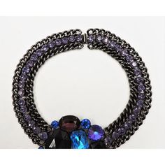 This is part of Chairish’s Costume Jewelry assortment.  Blackened Metal with huge faceted blue, black and purple prong set rhinestones with smaller round prong set faux-amethyst collar necklace with box clasp. Marked "Alexis Kirk." Measures: 7 1/4 inches long by 6 3/8 inches wide. Center; 3 inches long. Condition: Very good; some minor surface wear. Made for Alexis Kirk by Delizza & Elster. An identical necklace is shown on pg. 42 of "Juliana Jewelry the Last Generation," by Paula Knutson & Karl Juliana Jewelry, Book Pieces, Box Clasp, Black And Purple, Rhinestone Necklace, Collar Necklace, Prong Setting, Costume Jewelry, Blue Black