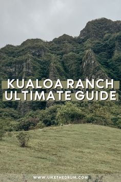 the words kualaoa ranch ultimate guide on top of a grassy field with mountains in the background