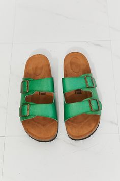 Add a pop of color to your summer look with these buckled slide sandals! Their comfortable design will keep you on your feet. while the adjustable straps allow you to tailor their fit and keep them secure all day. Wear as an everyday shoe all summer long with jeans. denim shorts. or biker shorts! Size fit: True to size Pattern type: Solid Type: Slides Toe: Open toe Heel height: Flats Heel shape: Flats Material: PU leather /Cork sole Imported Product measurements: Heel height: 1 inchLuis Shophas made a name for itself in European and Asian markets through footwear trade shows. In 2021. Luis Shopstarted its journey to the US market. All products are crafted with high-quality materials and designs that have been well-received in European and Asian markets. Luis Shopaims to provide fashionable Adjustable Strap Slip-on Footbed Sandals For Vacation, Trendy Double Strap Footbed Sandals For Vacation, Summer Adjustable Double Strap Footbed Sandals, Spring Slides With Rectangular Buckle Closure, Adjustable Buckle Closure Footbed Sandals, Green Open Toe Footbed Sandals With Buckle Closure, Beach Slip-on Footbed Sandals With Buckle Closure, Trendy Double Strap Footbed Sandals With Textured Footbed, Trendy Double Strap Footbed Sandals For Beach