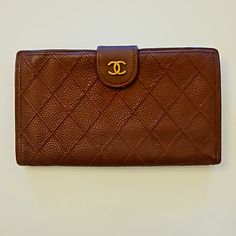 Chanel V Stitch Kiss Lock Long Leather Vintage Wallet In Maroon W/ Gold Hardware. This Is A Vintage Preloved Piece With Some Minor Wear. Inside Is Clean. Gold Hardware. Kiss Lock And Snap Is Working Great Condition. There Is Some Very Minor Peeling In The Leather On The Corners. Some Scratches As Expected For A Vintage Piece. The Inside Has Very Light Penmarks In One Spot. There Is A Serial Number Sticker, But The Protective Sticker Has Peeled Off And Is Unclear. Please Check The Images For More Vintage Wallet, V Stitch, Number Stickers, Chanel Bag, Red Gold, Gold Hardware, Kiss, Chanel, Bag Lady