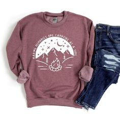 Looking for a cute versatile top to wear? Make sure to grab one of our Graphic Sweatshirts! This soft and comfortable shirt is the perfect top for any outfit. It can be paired with biker shorts, Jeans, or the classic stay at home sweats! This sweatshirt is true-to-size, so be sure to order your regular size! If you are looking for a more oversized look, make sure to size up. Winter Camping Graphic Print Tops, Cozy Outdoor Tops, Fall Camping T-shirt With Letter Print, Letter Print Top For Camping In Fall, Casual Fall Tops For Camping, Casual Tops For Fall Camping, Relaxed Fit Long Sleeve Tops For Camping, Long Sleeve Cotton Top For Camping, Relaxed Fit Graphic Sweatshirt For Camping