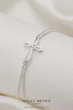 Sterling Silver Diamond Cherish Cross Bracelet | First Holy Communion Jewelry Gift for Girls | Molly Brown London Silver Bracelet With Cross Pendant As Gift, Silver Cross Bracelets For Gifts, Elegant Cross Pendant Bracelet As A Gift, Elegant Sterling Silver Cross Rosary Bracelet, Adjustable White Gold Cross Jewelry, Elegant White Cross Bracelets, Elegant White Cross Bracelet, Cross Pendant Jewelry For First Communion, Elegant Rosary Bracelet With Cross For Gift