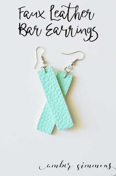 the earrings are made out of turquoise leather