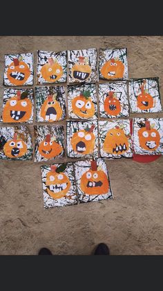 there are many pumpkins painted on the ground